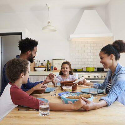 Family gathered around dinner table